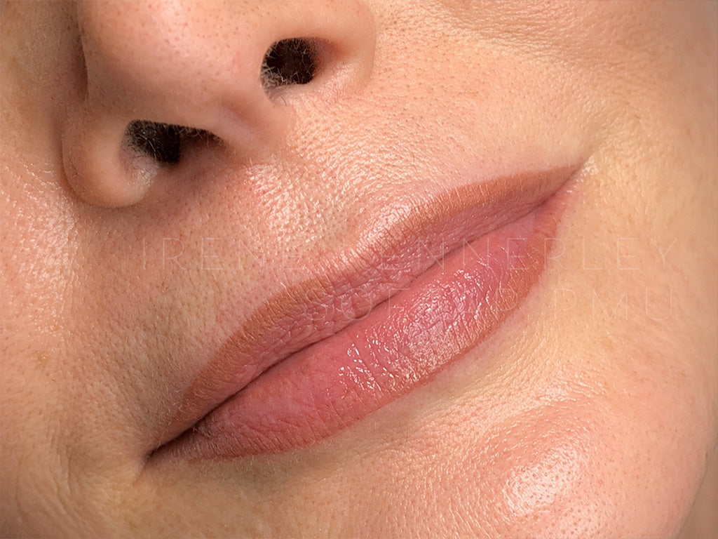 Close-up of softap permanent makeup nude lip blush