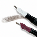 Eyebrow hairstrokes done with SofTap Nano Needle disposable tools with the SofTap hand method for permanent makeup on a white background
