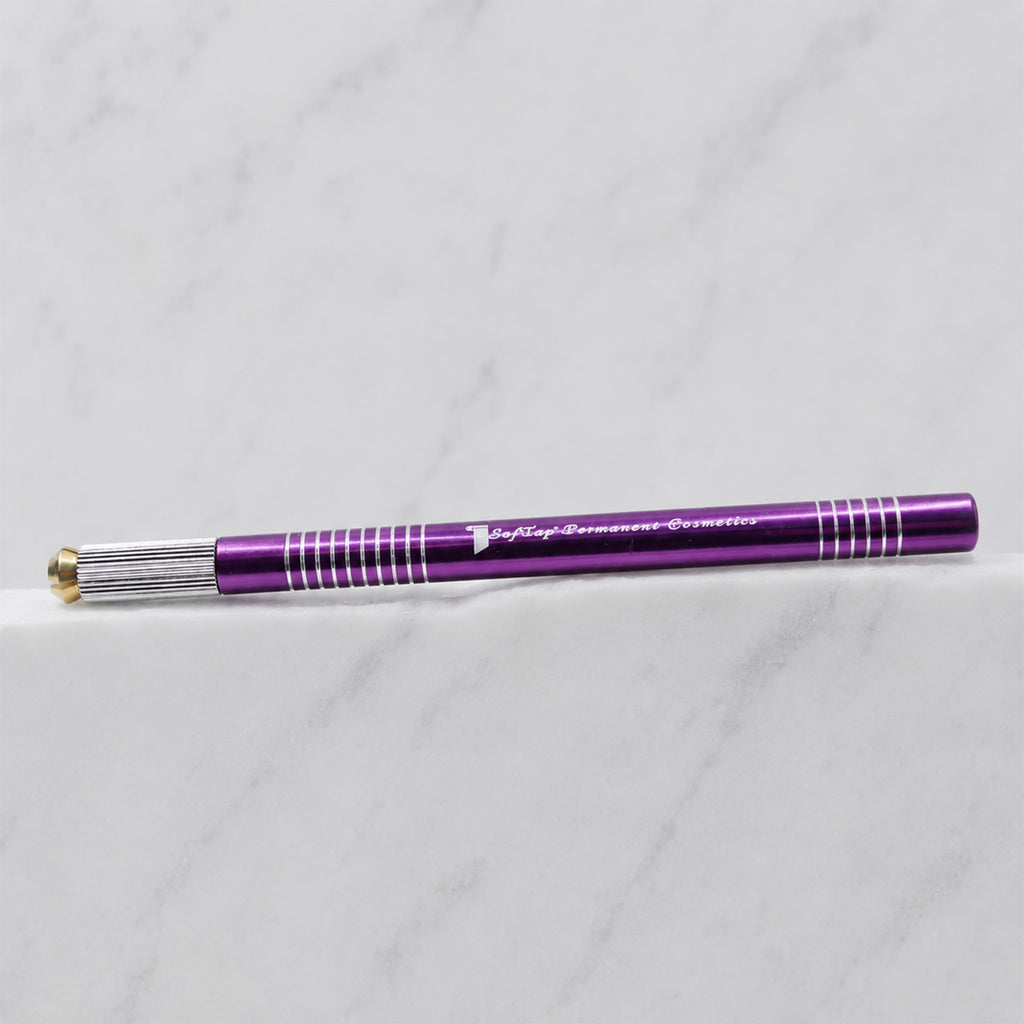 A close-up of SofTap small metal handle for foil cartridges, resting on a white marble surface.