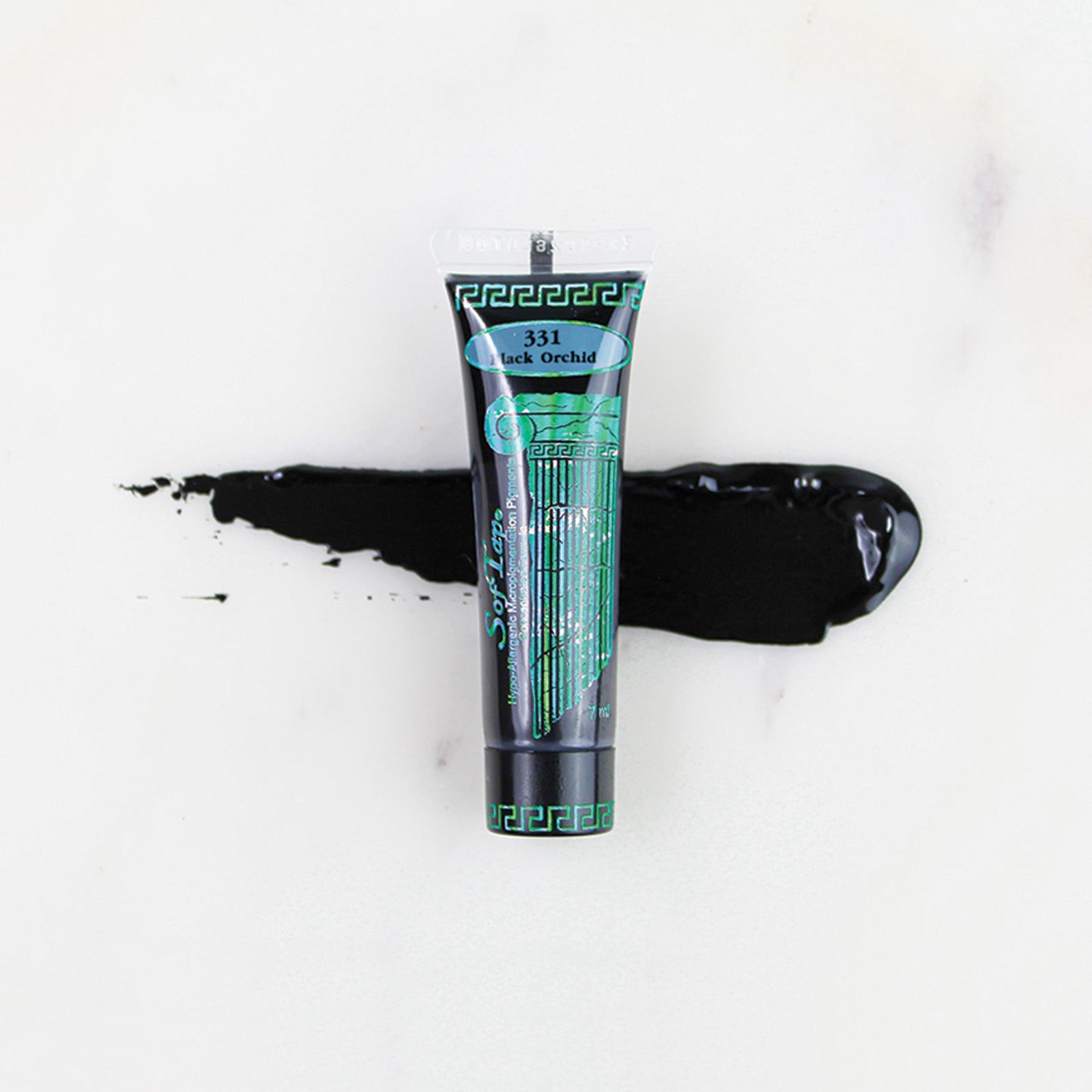 SofTap permanent makeup pigment Black Orchid tube with color swatch on marble background