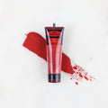 SofTap permanent makeup pigment Blushed Petals tube with color swatch on marble background