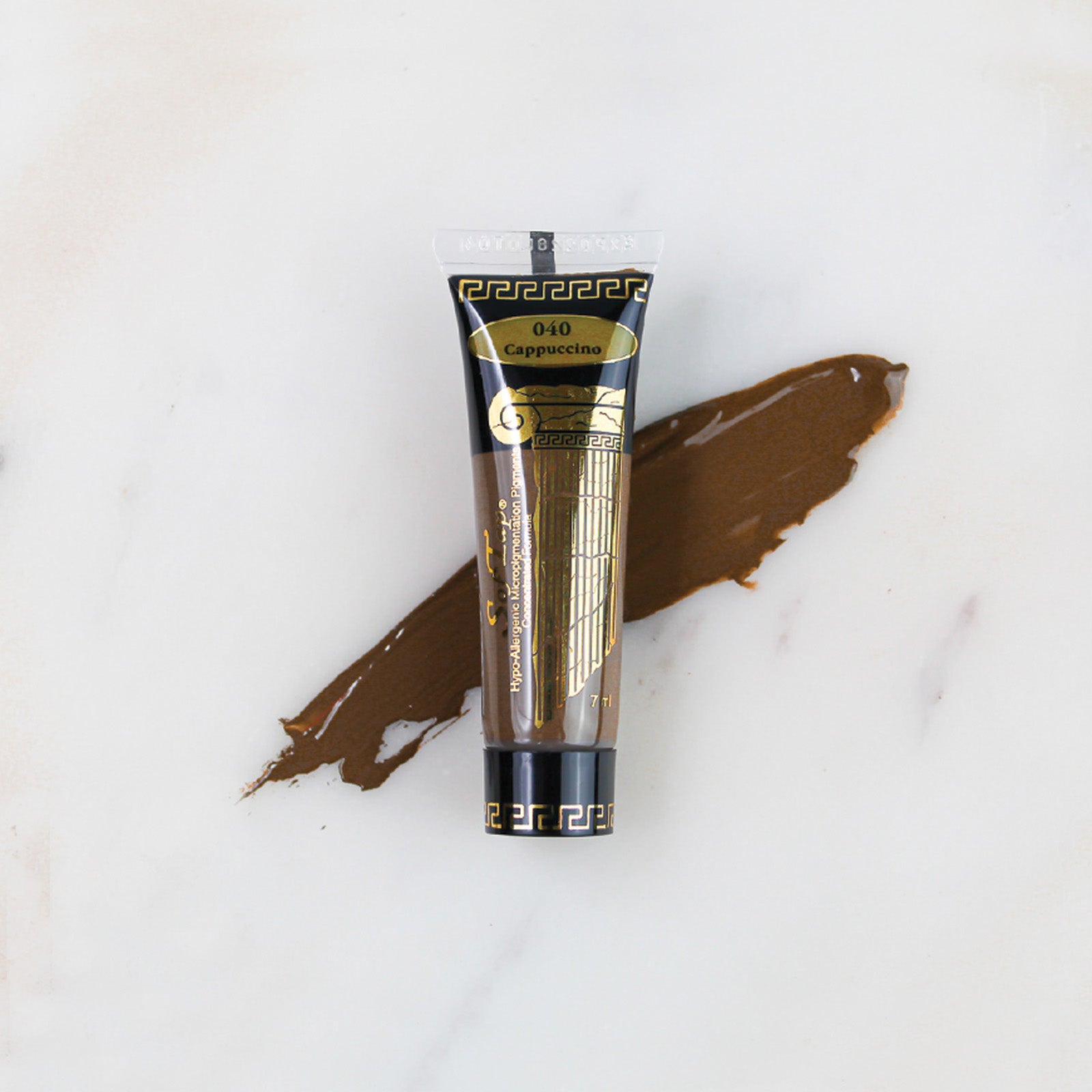 SofTap permanent makeup pigment Cappuccino tube with color swatch on marble background