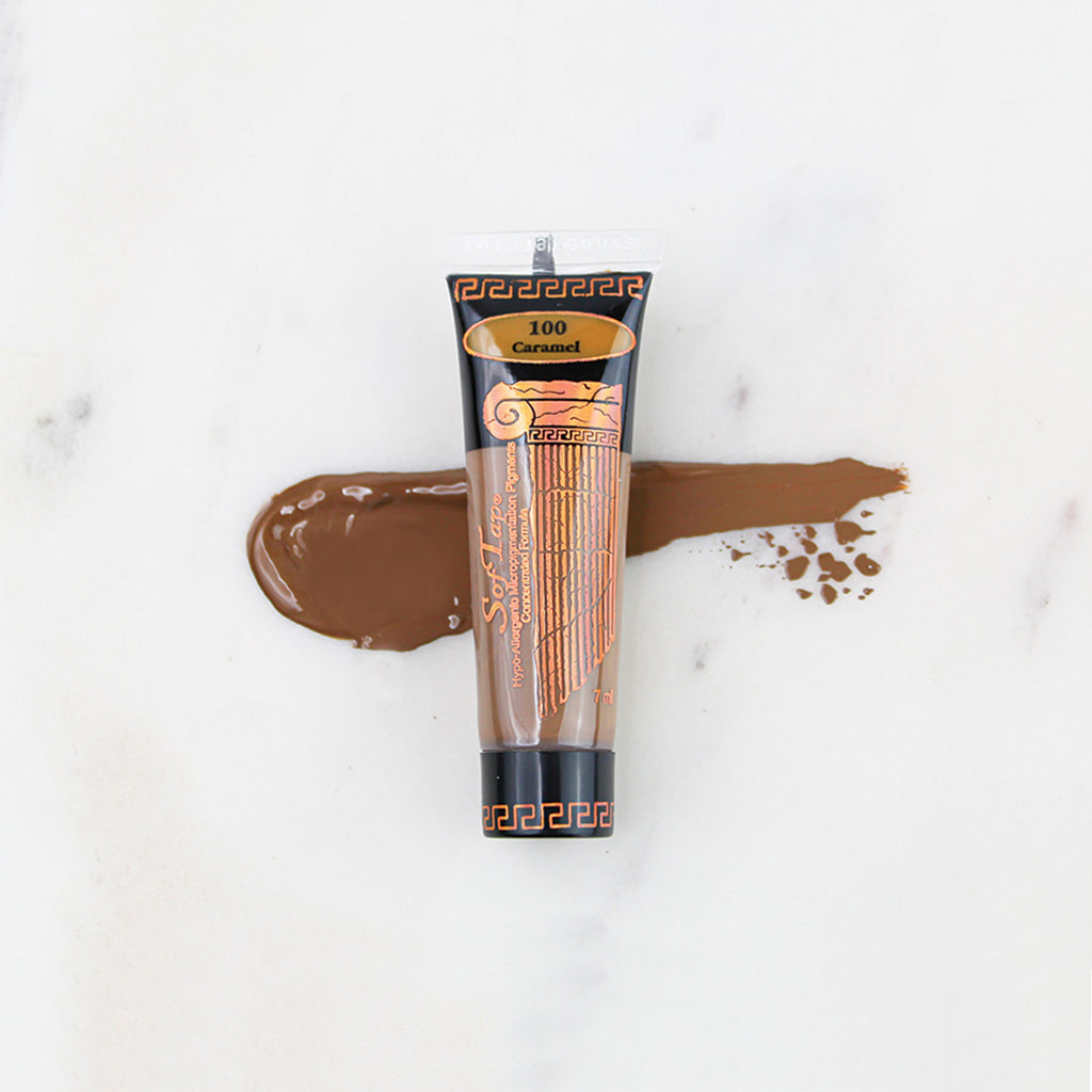 SofTap permanent makeup pigment Caramel tube with color swatch on marble background