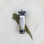 SofTap permanent makeup pigment Champagne tube with color swatch on marble background