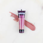 SofTap permanent makeup pigment Cherries Jubilee tube with color swatch on marble background