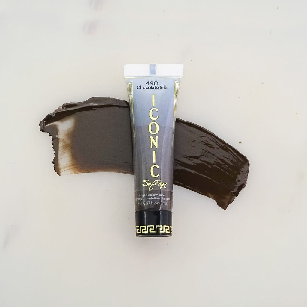 SofTap permanent makeup Iconic pigment Chocolate Silk tube with color swatch on marble background