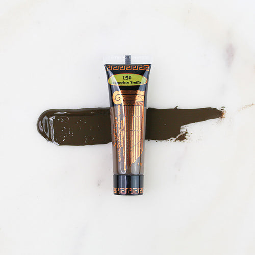 SofTap permanent makeup pigment Chocolate Truffle tube with color swatch on marble background