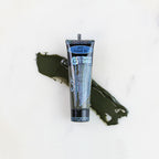 SofTap permanent makeup pigment Cool It tube with color swatch on marble background