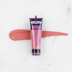 SofTap permanent makeup pigment Cotton Candy tube with color swatch on marble background