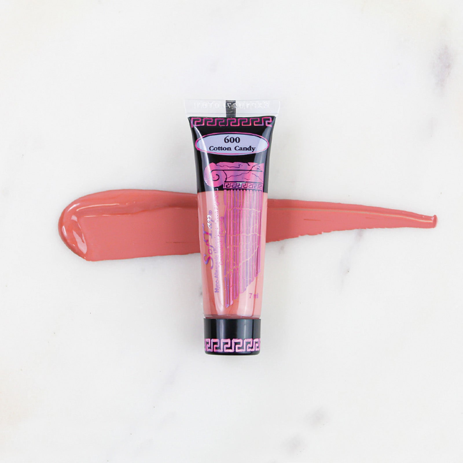 SofTap permanent makeup pigment Cotton Candy tube with color swatch on marble background