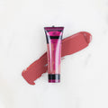 SofTap permanent makeup pigment Diva tube with color swatch on marble background