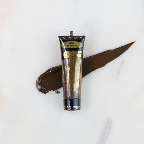 SofTap permanent makeup pigment Espresso tube with color swatch on marble background