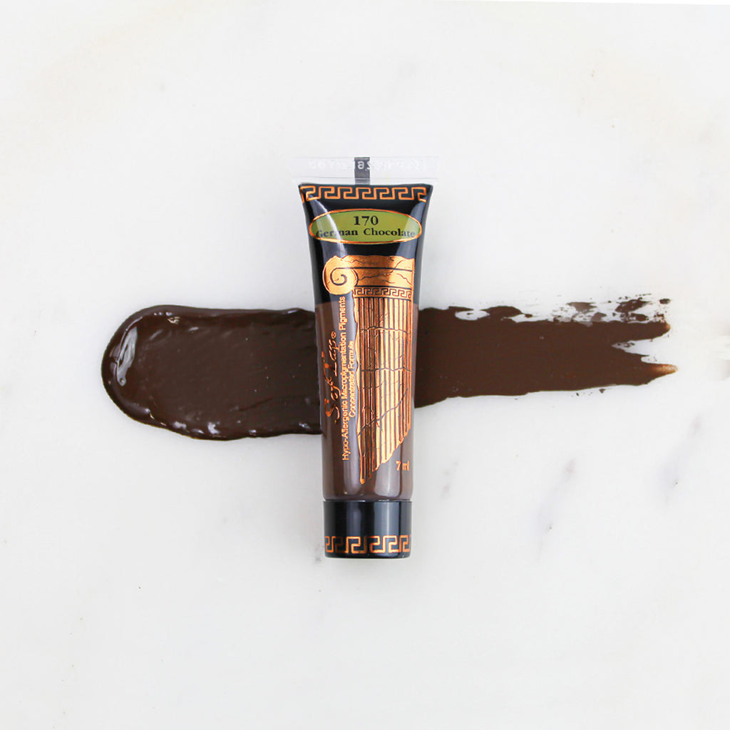 SofTap permanent makeup pigment German Chocolate tube with color swatch on marble background