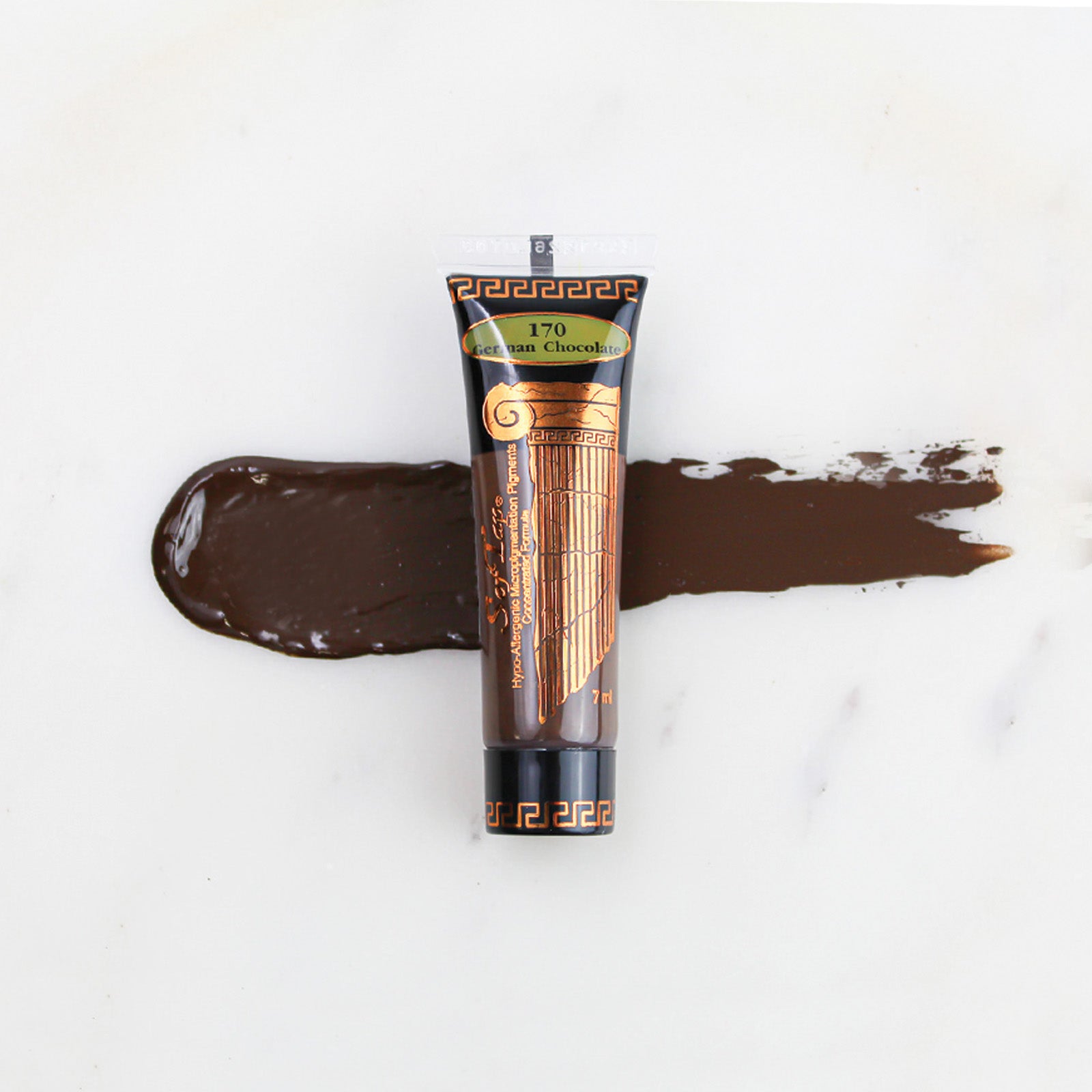 SofTap permanent makeup pigment German Chocolate tube with color swatch on marble background