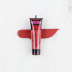 SofTap permanent makeup pigment Innocence tube with color swatch on marble background