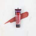 SofTap permanent makeup pigment Jamaican Rum tube with color swatch on marble background