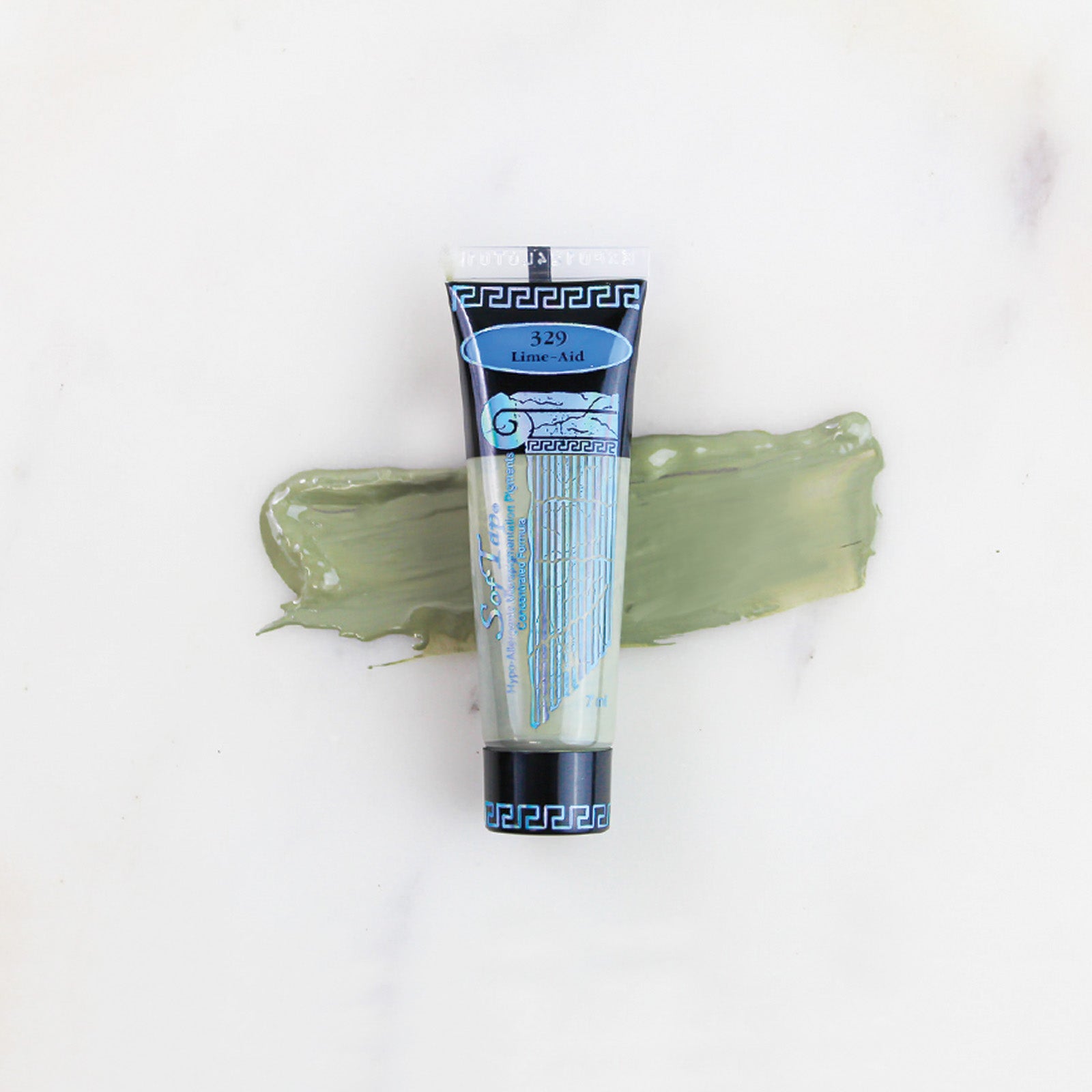 SofTap permanent makeup pigment Lime-Aid tube with color swatch on marble background