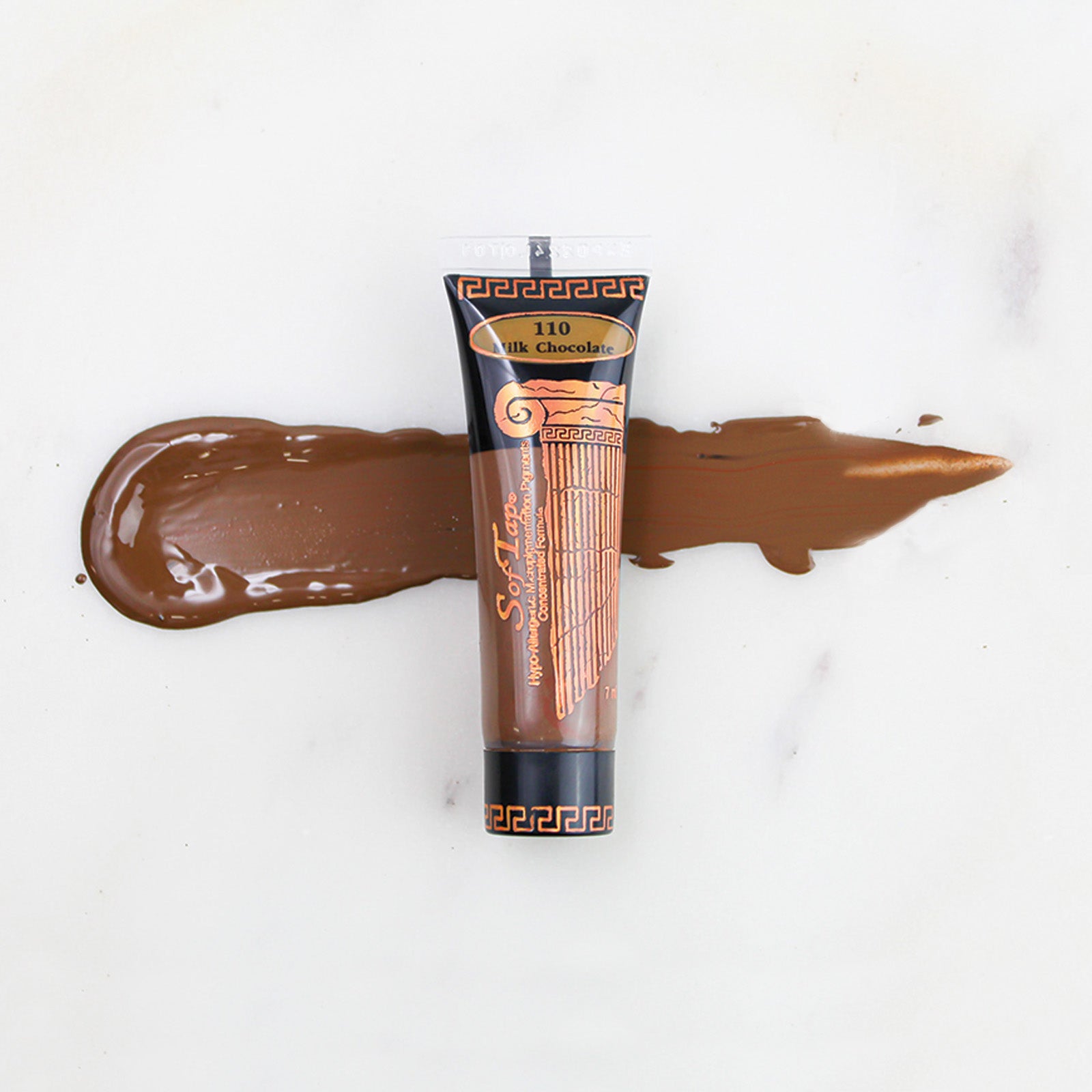 SofTap permanent makeup pigment Milk Chocolate tube with color swatch on marble background