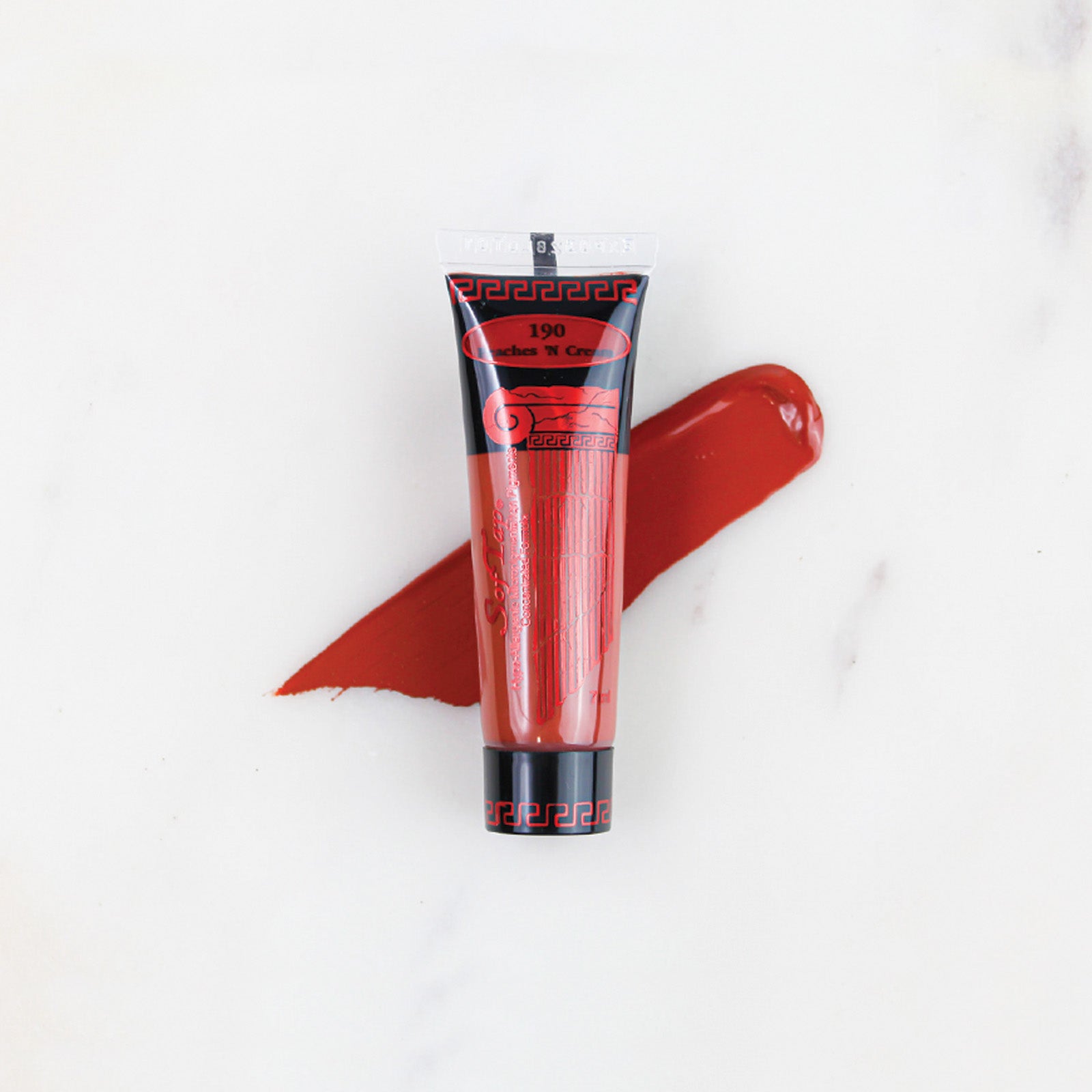 SofTap permanent makeup pigment Peaches 'N Cream tube with color swatch on marble background