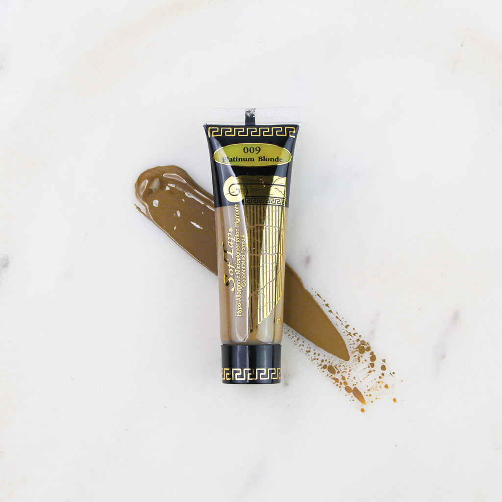 SofTap permanent makeup pigment Platinum Blonde tube with color swatch on marble background