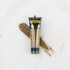 SofTap permanent makeup pigment Platinum Blonde tube with color swatch on marble background