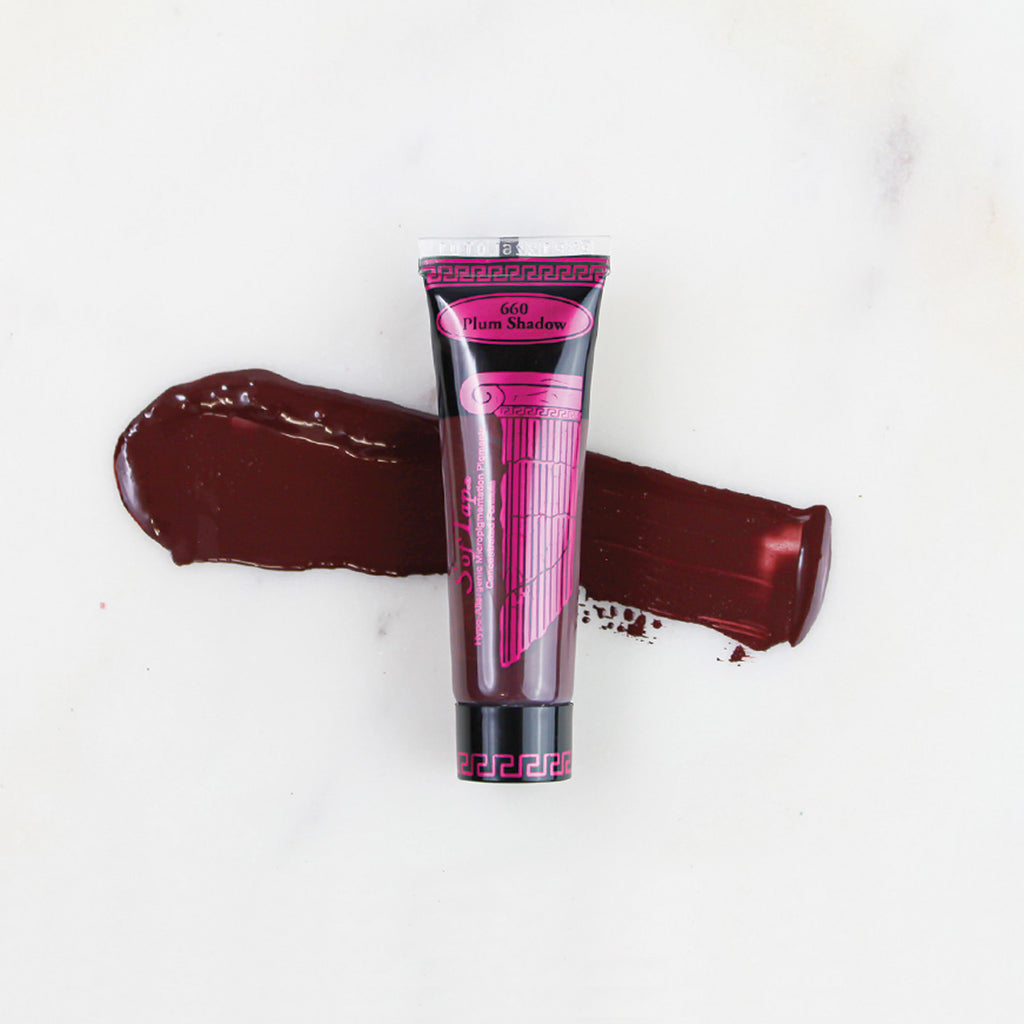 SofTap permanent makeup pigment Plum Shadow tube with color swatch on marble background