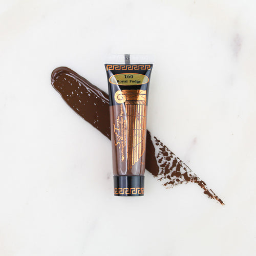 SofTap permanent makeup pigment Royal Fudge tube with color swatch on marble background