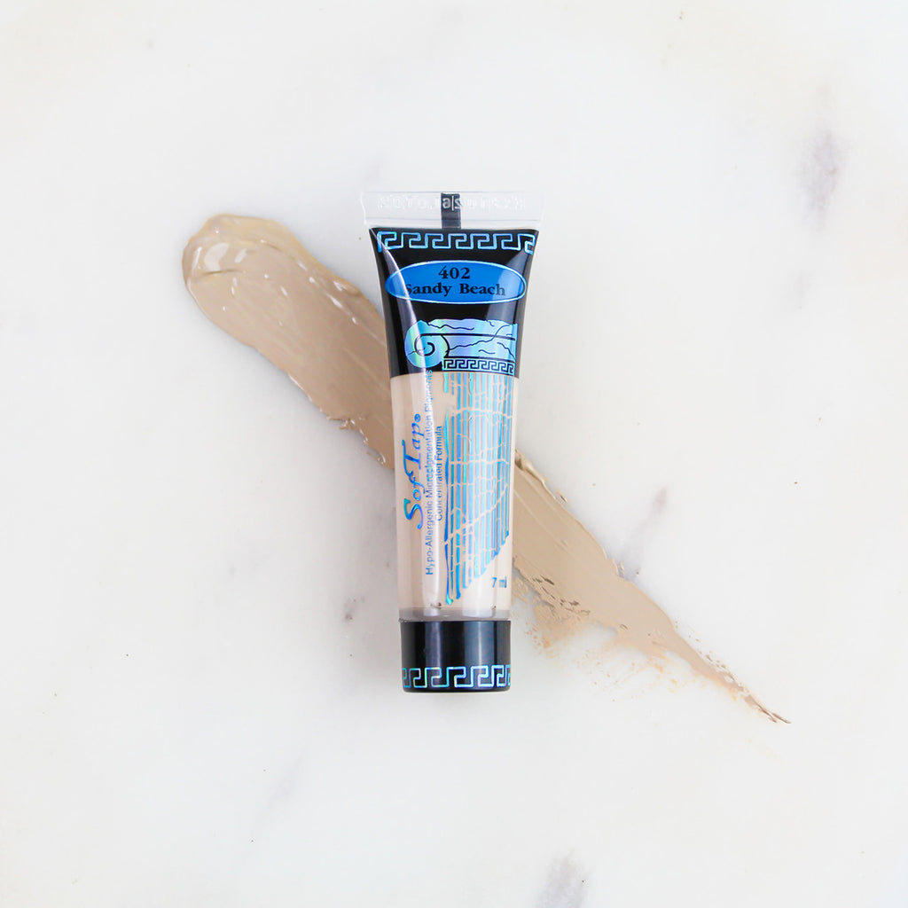 SofTap permanent makeup pigment Sandy Beach tube with color swatch on marble background
