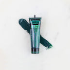 SofTap permanent makeup pigment Tempting Teal tube with color swatch on marble background