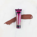 SofTap permanent makeup pigment Toffee Treat tube with color swatch on marble background
